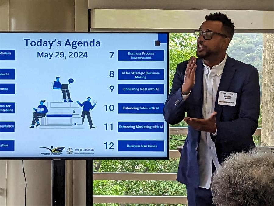 Michael Bowers presenting to a live business audience